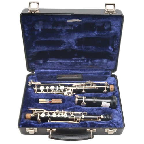 474 - A SELMAR BUNDY Oboe, series B41097, made in U.S.A, with a fitted case. Also a reproduction Kumaon Re... 