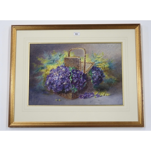 982 - BLANCHE ODIN (FRENCH 1865-1957) BASKET OF VIOLETS Watercolour, signed lower right, 36 x 54... 