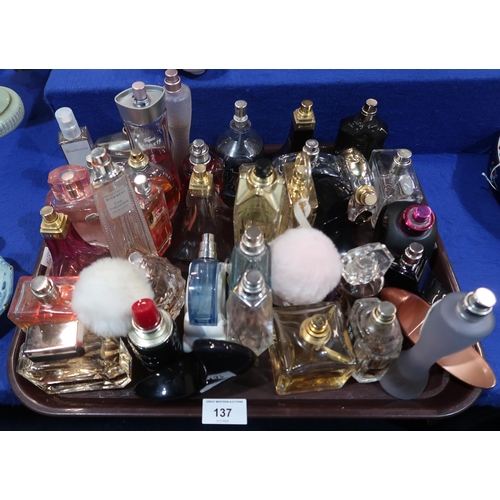 137 - A collection of mainly ladies perfume, mostly testers including Valentino, La Coste, Jennifer Lopez,... 