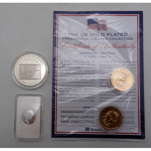 367 - The Fabulous 12 US Silver Dollar Collection. Twelve silver and gold plated coins in a presentation b... 