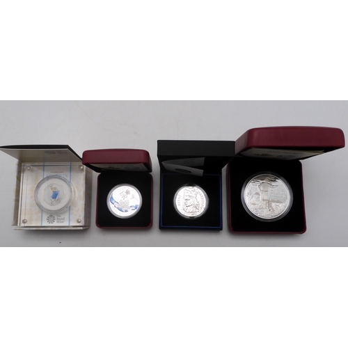 371 - Elizabeth II (1952-2022) A lot comprising 2013 'Coronation Jubilee £5 coin set' with... 