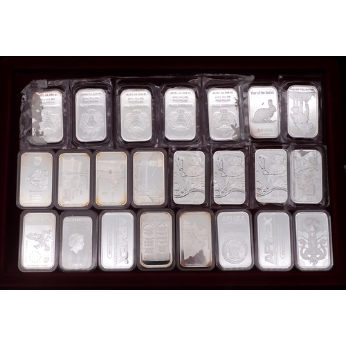 373 - SILVER BULLION A lot comprising fifty-two 1 oz silver ingots various themes (52), five 5 oz sil... 