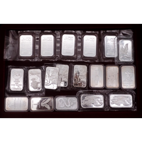 373 - SILVER BULLION A lot comprising fifty-two 1 oz silver ingots various themes (52), five 5 oz sil... 