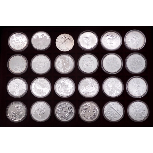 374 - A collector's case containing eighty 1 oz silver coins various themes approximately 2240 grams (80)