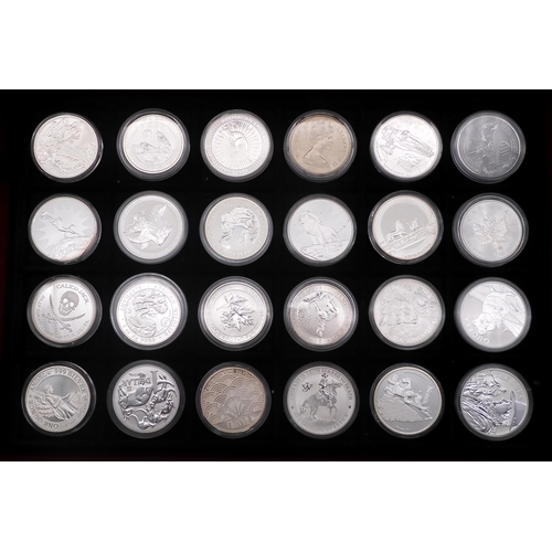 374 - A collector's case containing eighty 1 oz silver coins various themes approximately 2240 grams (80)