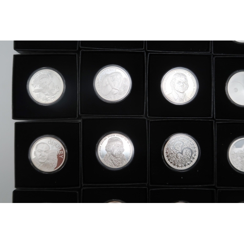 399 - A lot comprising thirty Silver Shield one troy silver coins various designs with boxes and COA appro... 