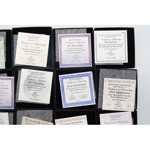 399 - A lot comprising thirty Silver Shield one troy silver coins various designs with boxes and COA appro... 