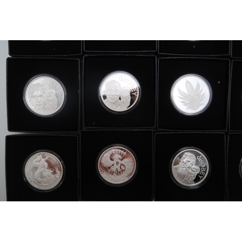 399 - A lot comprising thirty Silver Shield one troy silver coins various designs with boxes and COA appro... 