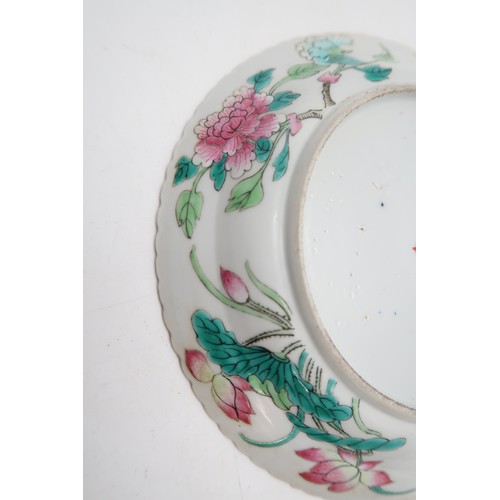 2407 - A CHINESE CELADON GROUND JARPainted with rockwork and foliage, 18cm high, Canton saucer 15cm diamete... 