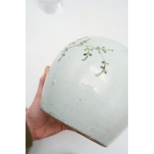 2407 - A CHINESE CELADON GROUND JARPainted with rockwork and foliage, 18cm high, Canton saucer 15cm diamete... 