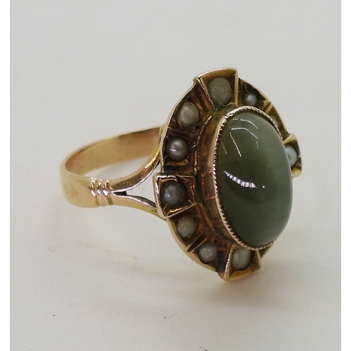 763 - Cats eye chrysoberyl & pearl ring, mounted in yellow metal, size of the chrysoberyl 11mm x 6.5mm... 