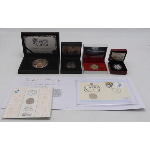 463 - A lot of various commemorative coins to include a Rudolph The Red Nosed Reindeer silver, gold plated... 