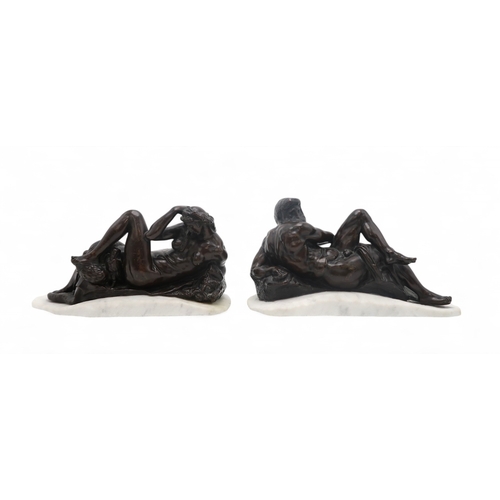 200 - AFTER MICHELANGELO BUONARROTI (ITALIAN 1475-1564)A pair of French bronze sculptures of Day and Night... 