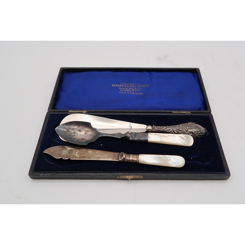 414 - A cased silver vanity set, by Jones & Crompton, Birmingham 1916, with some matched accessor... 