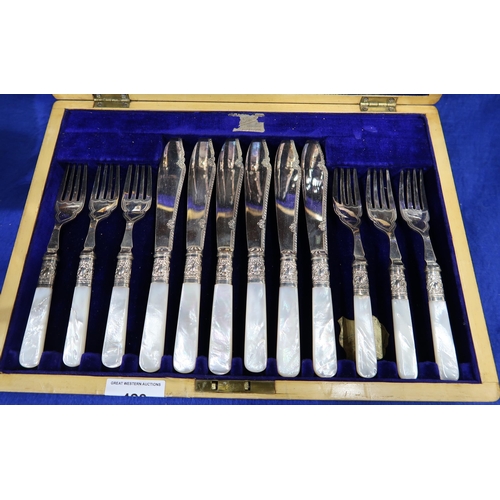 428 - A cased set of EPNS mother of pearl handled fish knives and forks, the blades with engraved scrollwo... 