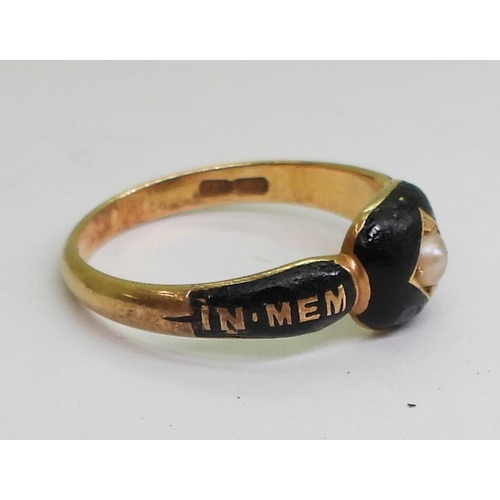 706 - An 18ct gold mourning ring, with black enamel and a pearl, hallmarked London 1884, finger size N1/2,... 