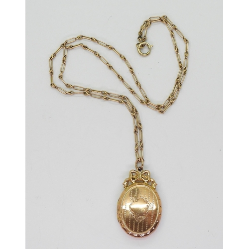 713 - A 9ct gold vintage locket, hallmarked Chester 1911, and fancy 47cm long chain, weight 7.3gms