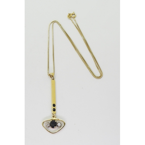 722 - A bright yellow metal sapphire and diamond bespoke pendant on an 18ct 45cm gold chain, weight togeth... 