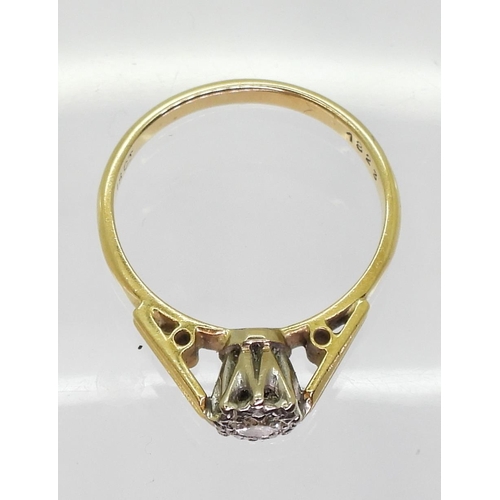 729 - An 18ct gold retro illusion set diamond solitaire ring, size M1/2, weight 3gms