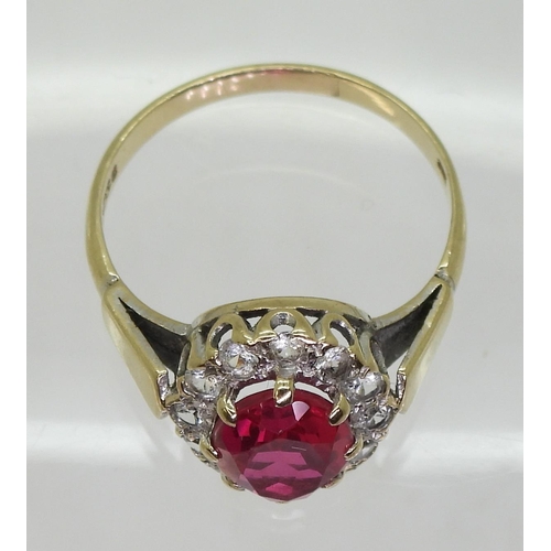 741 - A 9ct gold red and clear gem set ring, size O1/2, weight 2.5gms