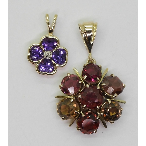 769 - A yellow metal garnet and zircon flower pendant in shades of pink, together with a 9ct amethyst and ... 