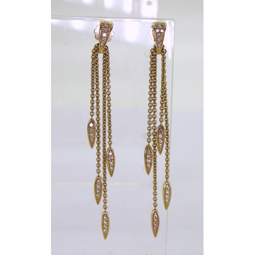 771 - A pair of 18ct gold earrings with seed pod shaped drops set with diamond melee, maximum length 6.5cm... 