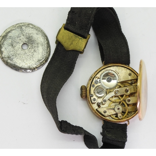 780 - A ladies 9ct gold vintage watch, with Glasgow import marks for 1929, weight including mechanism, met... 