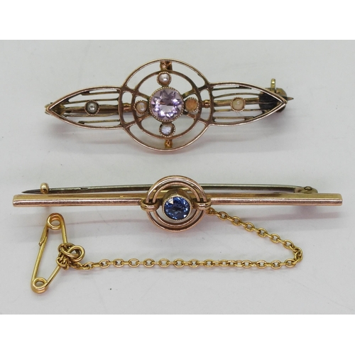 801 - A 9ct gold blue gem set brooch, together with a yellow metal amethyst set brooch, Weight combined 4.... 