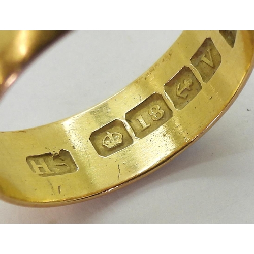 802 - An 18ct gold wedding ring, with Birmingham hallmarks for 1945, size N1/2, weight 4.2gms