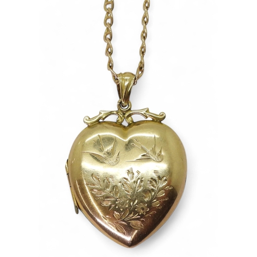 805 - A 9ct gold heart shaped 'Back & Front' locket engraved with love birds and flowers, length with ... 