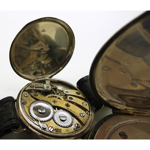 878 - A silver open face pocket watch hallmarked Birmingham 1930, and two silver wristwatches, one with an... 