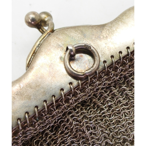 882 - A silver mesh handbag, a silver cased comb (comb..plastic) two silver charm bracelets with attached ... 