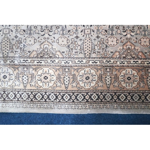 125 - A large light green coloured ground Moud style carpet with all over geometric foliate design within ... 