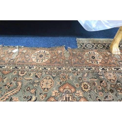 125 - A large light green coloured ground Moud style carpet with all over geometric foliate design within ... 