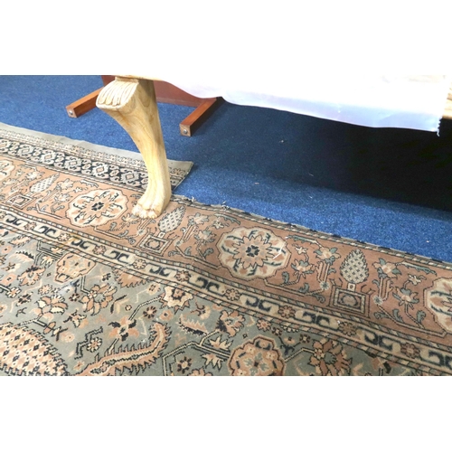 125 - A large light green coloured ground Moud style carpet with all over geometric foliate design within ... 