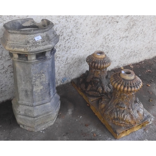 131 - A lot comprising a Victorian stoneware octagonal chimney pot, 81cm high and a pair of stoneware acan... 