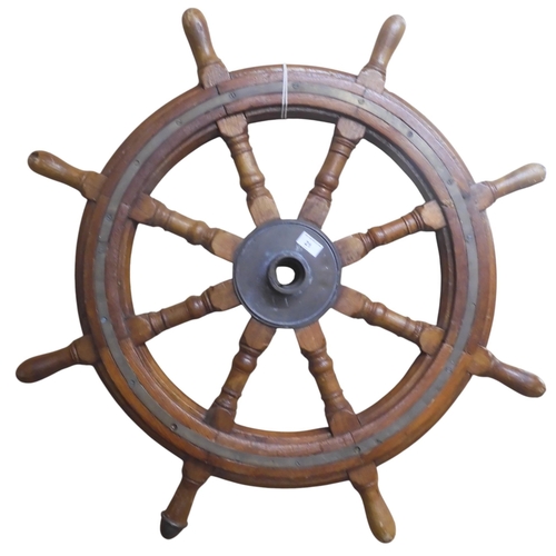 21 - An early 20th century elm and cast brass eight spoke ships wheel, 92cm diameter