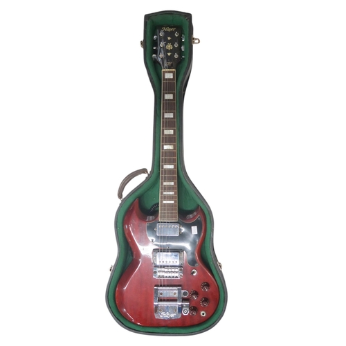 605 - A rare 1970's German made Hoyer SG electric guitar, with a burgundy solid body, two pickups and Scha... 