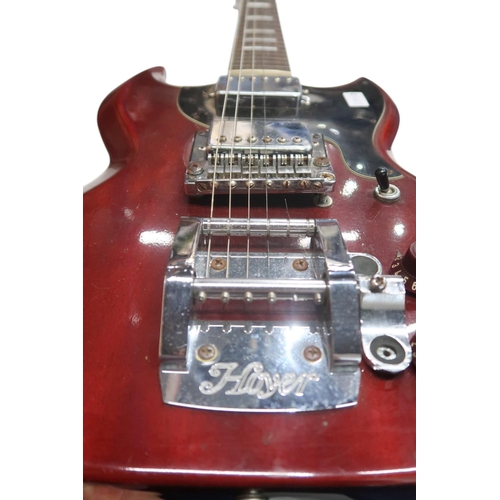 605 - A rare 1970's German made Hoyer SG electric guitar, with a burgundy solid body, two pickups and Scha... 