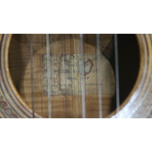 606 - MIGUEL RODRIGUEZA rare flamenco guitar with cedar top, maple back and sides, stamped internally and ... 