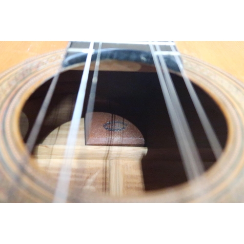 606 - MIGUEL RODRIGUEZA rare flamenco guitar with cedar top, maple back and sides, stamped internally and ... 