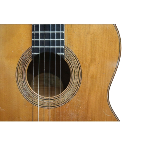 606 - MIGUEL RODRIGUEZA rare flamenco guitar with cedar top, maple back and sides, stamped internally and ... 