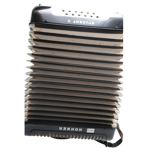 612 - A German made black Hohner Student II Piano Accordion, with 25 Keys and 12 Bass Buttons, in cas... 