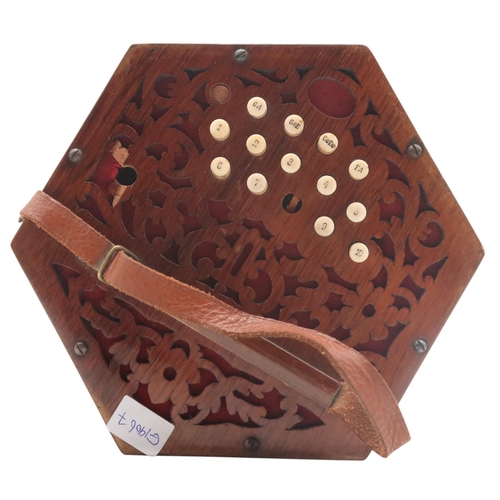 616 - A German imitation of a Louis Lachenal 20 key Anglo concertina with 6 bellows and pierced veneer end... 