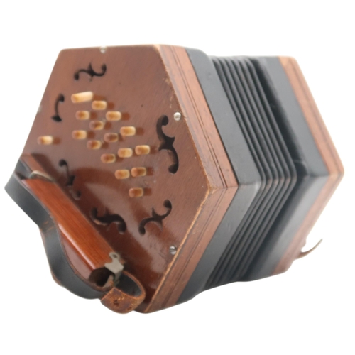 617 - A 31 key Anglo concertina with 6 bellows and pierced veneer ends, serial number 1487