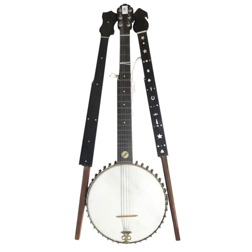 621 - W.T.B. Sterling seven-string banjo, late 19th century, with an open back and conventional dot inlay.... 