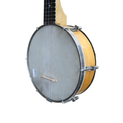 630 - A banjo ukulele, British maker with decorative metal backplate, with case 