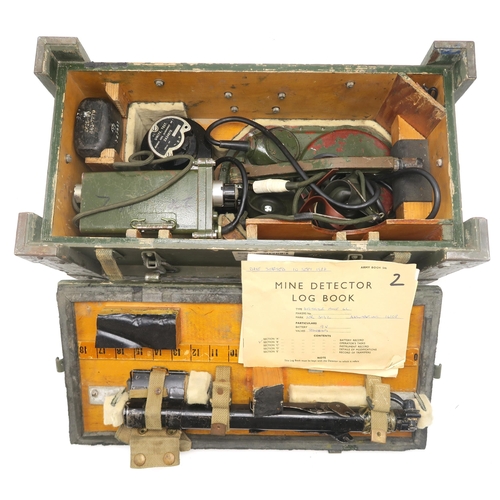 478 - A military No. 4C mine detector, housed in a reinforced crate, with an accompanying log book recordi... 