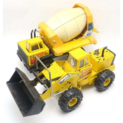 495 - Six various Tonka Trucks, comprising a tractor and trailer, cement mixer, bulldozer, crane etc.