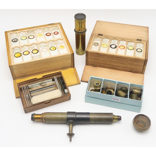 505 - A lacquered brass microscope by J. Lizars of Glasgow, housed in a mahogany travel case; with a quant... 